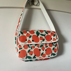 Francesca’s purse with orange design